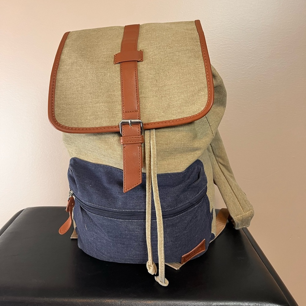 Backpack, with drawstring and top flap
